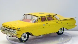 Restoration of Corgi Chevrolet Impala Taxi No. 480. Die-cast model spring. Playing parts.