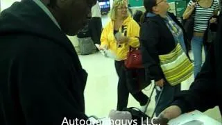 R-Truth Rtruth Ron Killings WWE star signing autographs while in St. Louis, MO at Lambert Airport