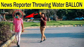 #Throwing Water Balloons By News Reporter //Throwing Water Balloons Prank#