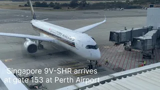 Singapore 9V- SHR arrives at gate 153 at Perth Airport.