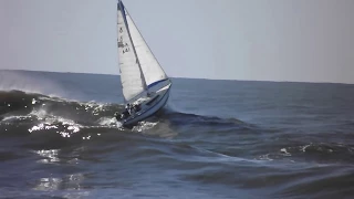 sail boat going out port macquarie bar