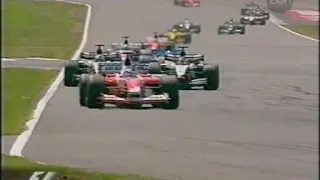 Raikkonen overtakes Trulli, Coulthard & Panis (Silverstone 2003)