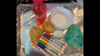 Dying eggs using crayola markers and a coffee filter.