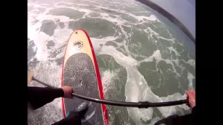 SUP paddle board surfing Crantock Cornwall on the FatStick Red Ripper