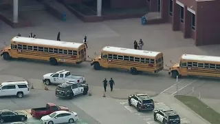 1 student dead in shooting on Arlington high school campus; suspect in custody, police say