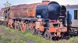 Old Abandoned Rusty Trains In UK. Abandoned Train Cars On The Barry Scrapyard. Ghost Train