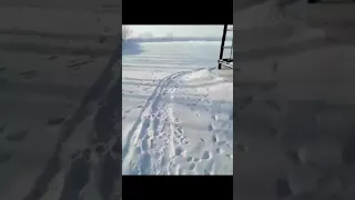 Crazy Russian guy swimming in a frozen lake !! fish hole?