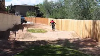 Pro Mountain Biker - Ross Schnell on his backyard pump track