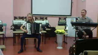 Girl plays the accordion "Waltz". Девочка играет на аккордеоне "Кукушкин вальс".