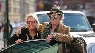 Rolling Stones' Keith Richards chats with a fan in Soho in New York City