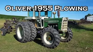 Oliver 1955 FWA tractor plowing with Oliver 448 plow.