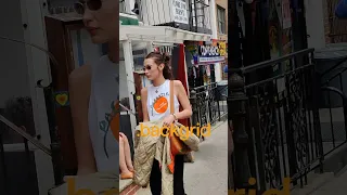 Bella Hadid Pairs ‘Free Palestine Top’ With Flare Pants and Red Sneakers in NYC