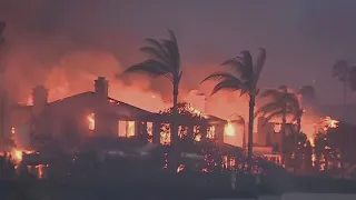 California fire destroys mansions