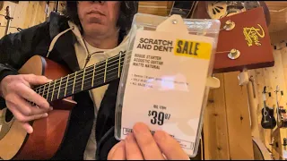 This Dude playing $39.99 Cheap Acoustic Guitar at Guitar Center