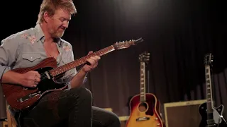 Josh Homme playing George Harrison's Telecaster