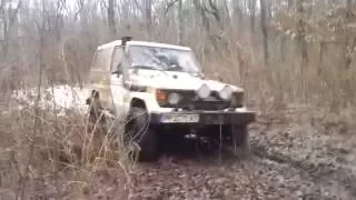 Toyota land cruiser lj 73 in ice swamp  and mud