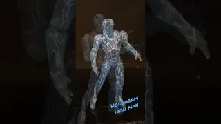 Hologram Iron Man marvel legends action figure showing off his ultimate illumination in cool blue