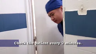 Assisting a patient to shower bath.