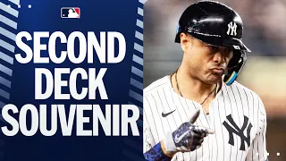 Giancarlo Stanton sends a souvenir to the SECOND DECK! 😨