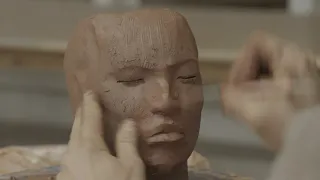 Cristina Córdova sculpts a head