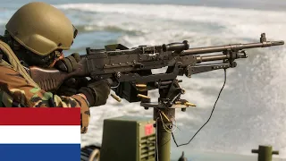 Black Devils. Dutch marines on speedboats during a live fire exercise.