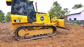 Amazingly! Caterpillar bulldozer working to repair the less road on the mountain full skill operator