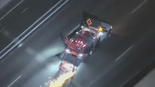 Police Chase: Suspected stolen construction truck leaves trail of sparks on 10 Freeway
