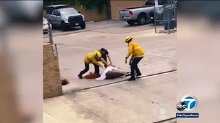 LAFD firefighters strike, drag man accused of trying to break into station | ABC7