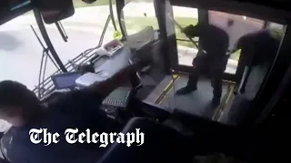 Dramatic shootout between driver and passenger on moving bus caught on CCTV