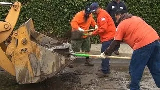 Mud cleanup begins in Los Angeles' eastern suburbs