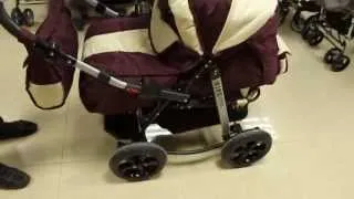 Детская коляска. Амортизация на ремнях.
