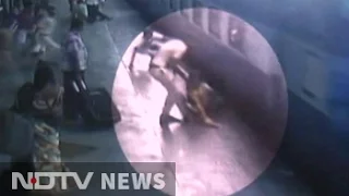 Caught On Camera: Woman Jumps Off Moving Train; Cop Saves Life