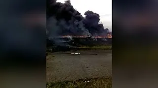 Raw: Video Captures MH17 Crash Aftermath