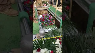 lowering the casket Sip Mayiya