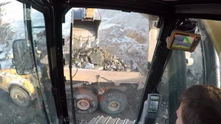 Cat 352 F XE, enjoying my day loading good blasted rock... until I hit a hard spot! Incab view