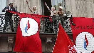 Femen protest disrupts Marine Le Pen's May Day rally