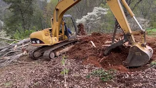 Removing Stump with Excavator