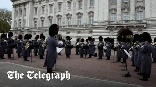 Changing of the guard plays 'Gangnam Style' outside Buckingham Palace