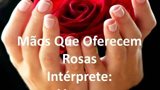 MÃOS QUE OFERECEM ROSAS