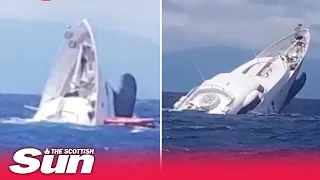 Moment superyacht sinks off Italian coast as 9 rescued