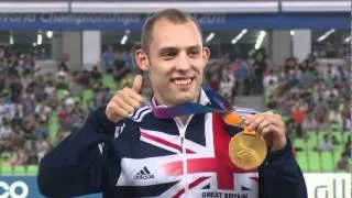 Dai Greene receives his gold medal for the 400m Hurdles