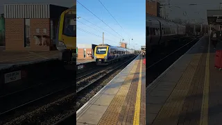 Class 195 departs Wigan North Western