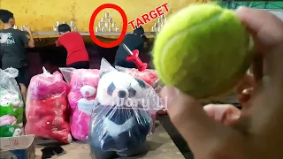 Game Lempar Kaleng Pasar Malam Tepat Sasaran