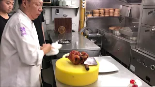 Chef Jian Chit Ming prepares his famous chicken at 2 Michelin star Canton 8 in Shanghai, China