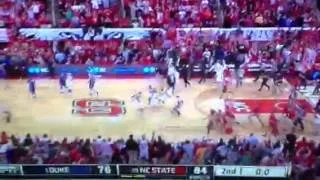 NC State rushes the court against duke.