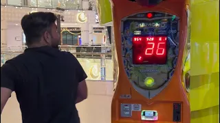 "Defeated by Friend! Punching Machine Challenge: Hilarious Results Caught on Camera!"