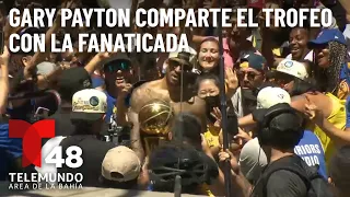 Gary Payton II comparte el trofeo del campeonato de la NBA con la fanaticada