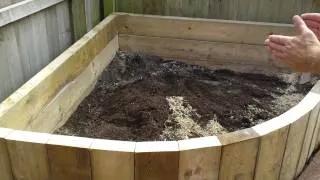 Raised Beds Using Timbers Installed In A Vertical Format