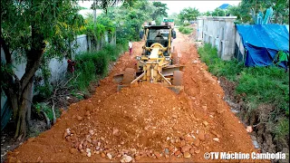 Inteligencia techniques driver skill with motor grader pushing and grading stone making road