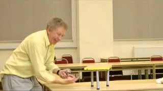 Ball bouncing under a table